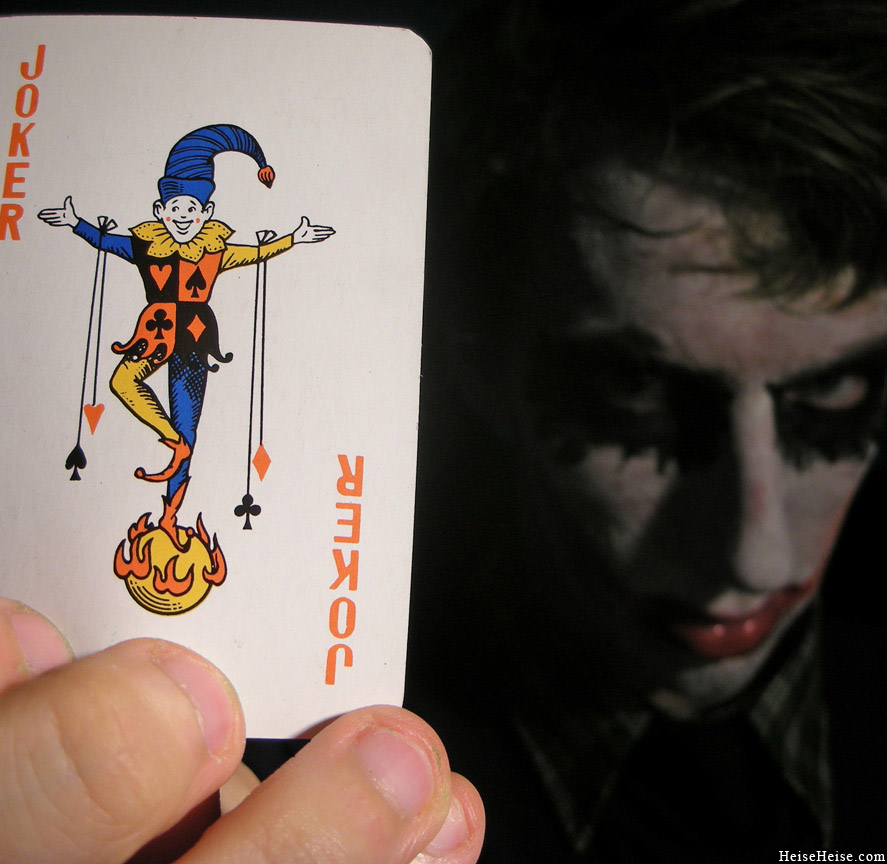 Picture of me holding a deck of card's joker