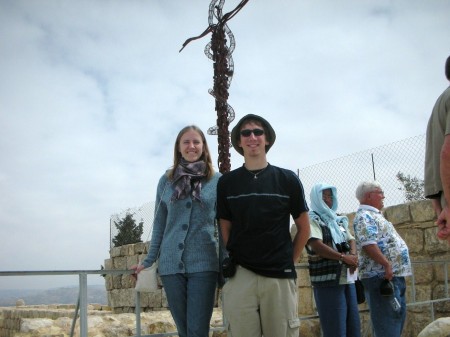 On top of Mount Nebo with the famous Italian cross-and-snake behind us