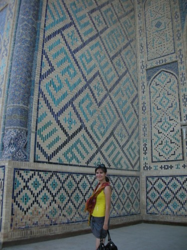 Bibi at the entrance to the Mi'hreb niche at the back of the Po-i-Kalyan mosque. Behind her, the name of God - الله - is carved into the stone