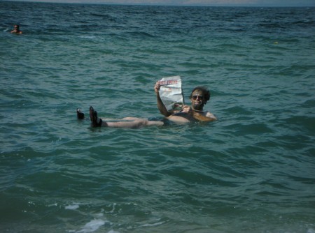 Just a regular day for dad, reading the newspaper while floating in salt water in the holy land