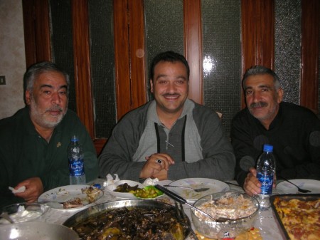 Wajih, Khalil and Maher (the accountant) enjoy the well-endowed spread