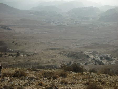 On the final (and hardest) downhill before reaching Beyda, that dim group of buildings in the middle of the plain there