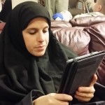 Victoria, our leper, enjoys some light reading before putting on her rotting-face makeup